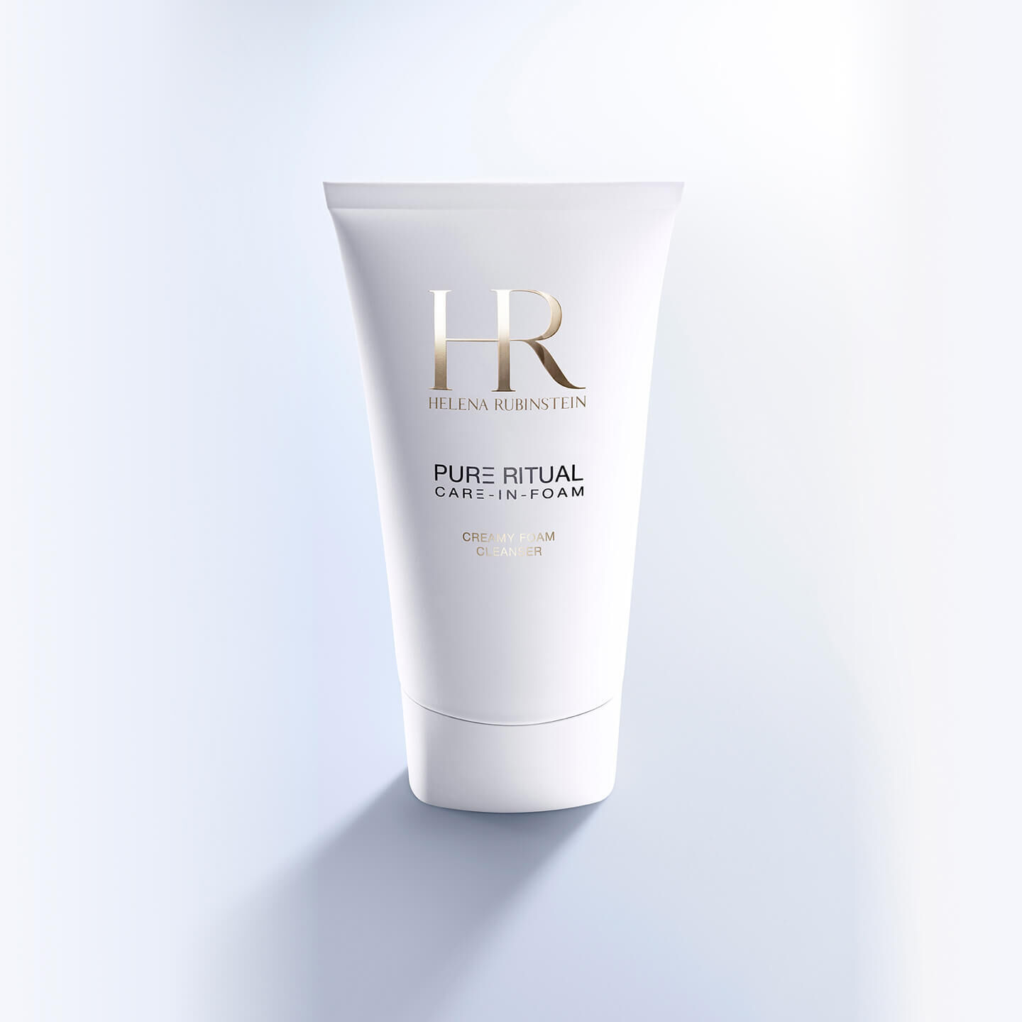 Frontansicht der Verpackung von Pure Ritual Care-in-Foam von Helena Rubinstein vor blauem Hintergrund.