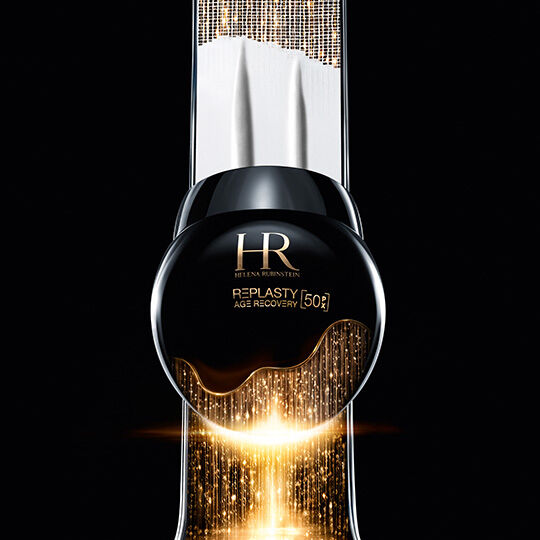 A visual featuring a round, glossy black jar of Helena Rubinstein Replasty 50PX Age Recovery Night Cream set against a solid black background. 